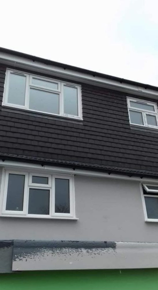 Rendered and clad house facade