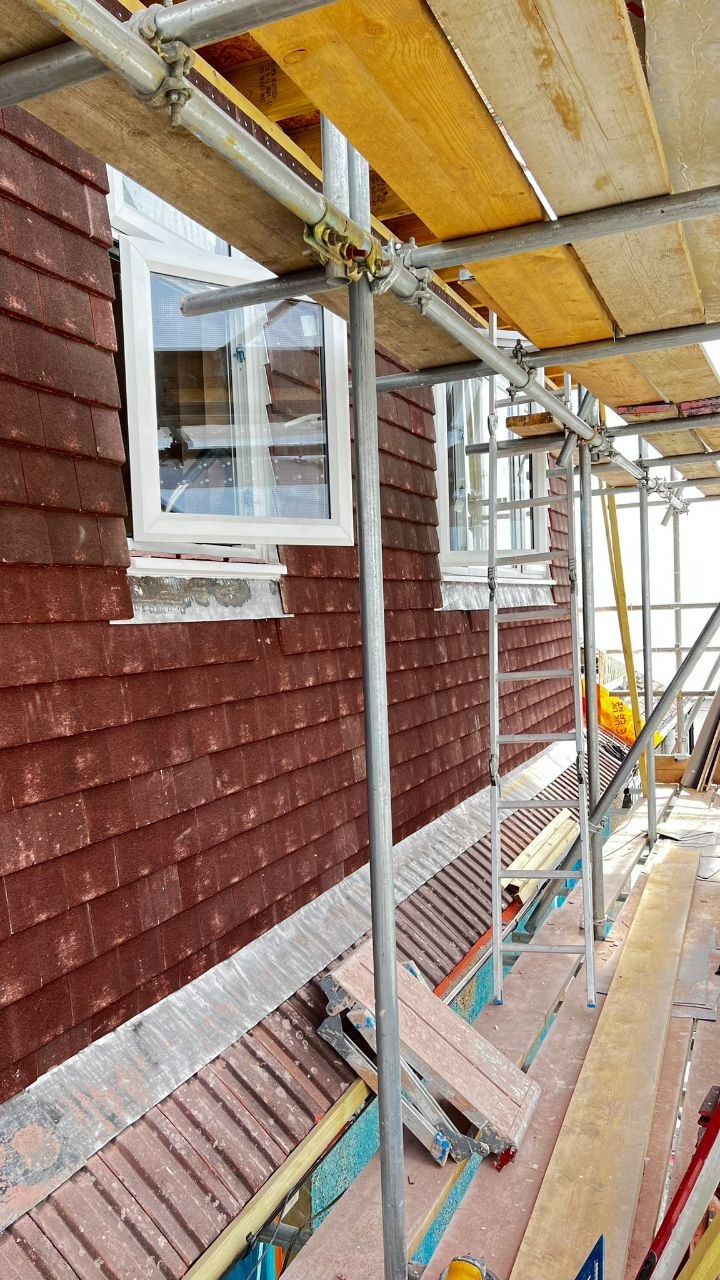 Tile cladding and lead flashing